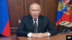 Președintele rus Vladimir Putin se adresează națiunii la Moscova, Rusia, 21 noiembrie 2024, conform unui videoclip difuzat de Kremlin.
