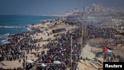 ღაზის სექტორის სამხრეთიდან დევნილი პალესტინელები უბრუნდებიან ტერიტორიებს ჩრდილოეთში, სადაც მათი საცხოვრებელი იყო (საილუსტრაციო ფოტო)