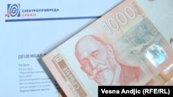 EPS je i kompanija sa najvećim finansijskim gubitkom, zvanični su podaci Agencije za privredne registre. Fotografija: dinari i račun za utrošak struje, arhiva