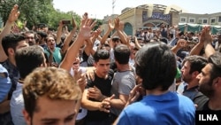 The protest came a day after demonstrators forced two major mobile-phone and electronics shopping centers in Tehran to close.