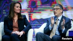 "Microsoft" компаниясынын негиздөөчүсү, миллиарддер филантроп Билл Гэйтс жана жубайы Мелинда, 23-январь 2015-жыл. 