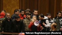 The incident at RFE/RL's bureau in Yerevan happened in the early hours of the morning of November 10, when protesters also stormed government buildings and parliament (pictured).