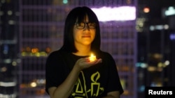 Chow Hang Tung, una dintre organizatoarele priveghiului din Hong Kong, a fost arestată.