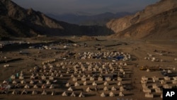 Tents stand in a migrant camp at the Pakistan-Afghanistan border in Torkham, Afghanistan, Friday, November 2023