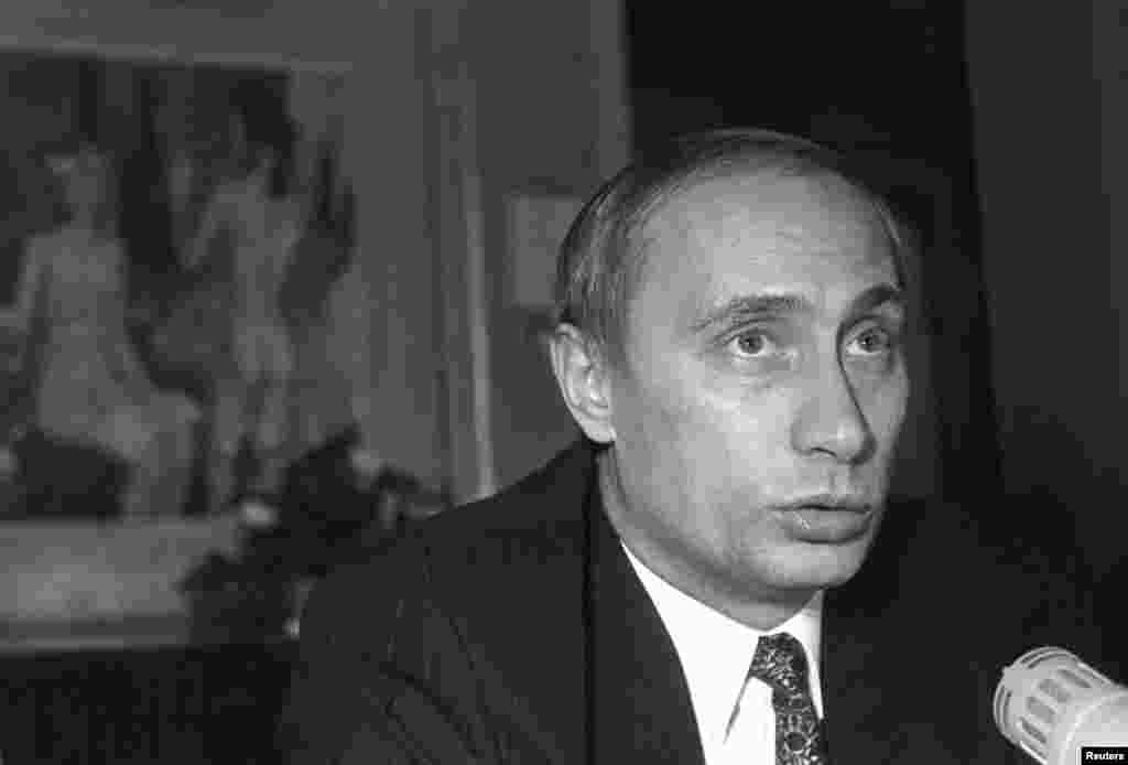 Vladimir Putin, the city's newly appointed first deputy mayor, attends a news conference in St. Petersburg in December 1995.