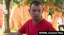 Микола, един от жителите на ударената от Русия сграда, който е бил заклещен под развалините ѝ.