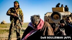 «Ислам мамлекети» террордук уюмунун согушкерлери. 