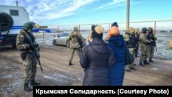 Қримдаги тинтувлардан лавҳа