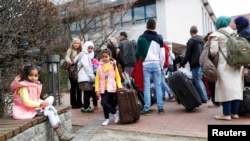 Германи -- Шемара мухIажираш Friedland олучу Германин гIалахь. Охан. 4, 2016