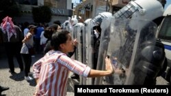 Protesta pas vdekjes së Nizar Banat. Bregu Perëndimor, 24 qershor, 2021. 