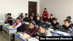 Шиңжандагы кайра тарбиялоочу лагерлер.