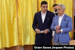 George Simion și Călin Georgescu la vot (imagine de arhivă).