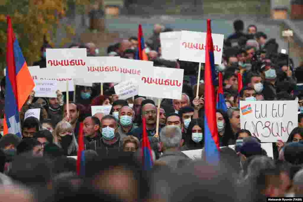 Protester rally in Yerevan on November 12 against Armenia's agreement to end fighting with Azerbaijan over Nagorno-Karabakh.