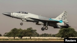 FILE: A Pakistan Air Force jet takes off in 2013.