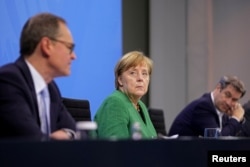 Angela Merkel a cerut României să investigheze actele de corupție ale oamenilor de afaceri cu strânse legături politice, ca parte a combaterii corupției la nivel înalt