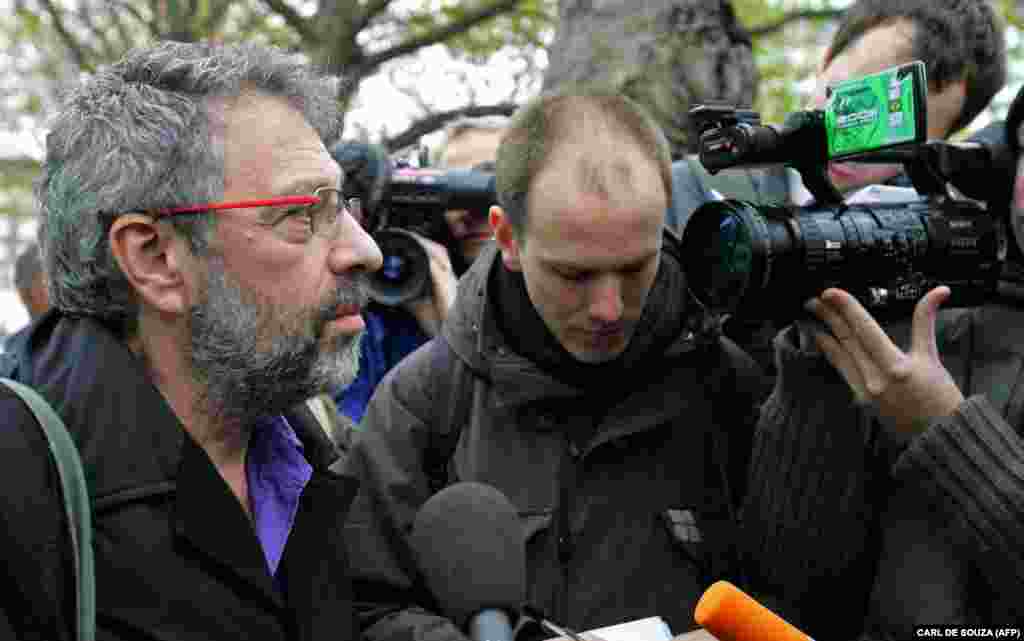 Alex Goldfarb (left), a close friend of Litvinenko's, is interviewed by the media as he arrives at University College Hospital in central London on November 20, 2006. Litvinenko dictated a statement two days before his death, which was read out by Goldfarb.