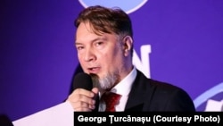 George Turcanasu.