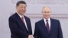 სი ძინპინი (მარცხნივ) და ვლადიმირ პუტინი