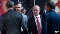 Обама жана Путин Перунун борбору Лимада жолуккан учур. 20-ноябрь, 2016-жыл.