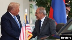 U.S. President Donald Trump welcomes Armenia's Prime Minister Nikol Pashinyan to the White House in Washington, August 8, 2025.