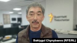 Таалай Жакыпов.