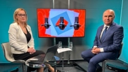 Președintele interimar, Ilie Bolojan, alături de jurnalista Anca Grădinaru