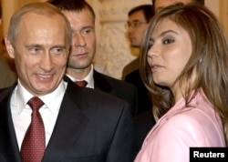 Уладзімір Пуцін і Аліна Кабаева, архіўнае фота