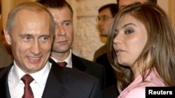 President Vladimir Putin and gymnast Alina Kabayeva at a Kremlin event in 2004