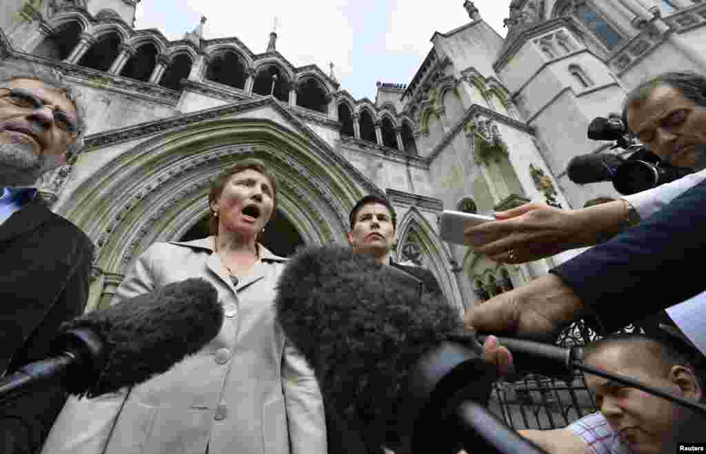 Marina Litvinenko speaks to the media as she leaves the High Court in London on July 12, 2013, amid calls for&nbsp;a public inquiry into her husband's death.