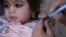 An Afghan girl receives a polio vaccine in the southern Afghan city of Kandahar.
