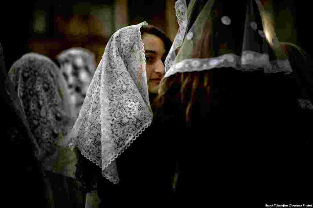 Tufankjian says no matter how diverse their adopted cultures, an "invisible thread" continues to tie the world's Armenians together. Here, a young girl attends services at the St. George Armenian Apostolic Church in Sao Paulo, Brazil.&nbsp;