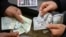 increase in the price of the dollar in Iran.