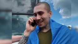 'Hello Mom, I'm Home!': Hugs And Cheers As Ukraine And Russia Swap POWs
