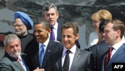 A growing club: some G8 leaders, and some G14 leaders, at the summit in Italy