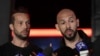 Andrew Tate (în dreapta) și fratele său, Tristan, spun că intenționează să rămână în România și că își vor dovedi nevinovăția în instanță.