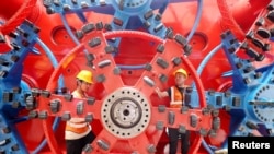 Темир жол курулушундагы кыйталык жумушчулар