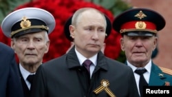 Russian President Vladimir Putin takes part in a commemoration ceremony in Moscow on May 9.