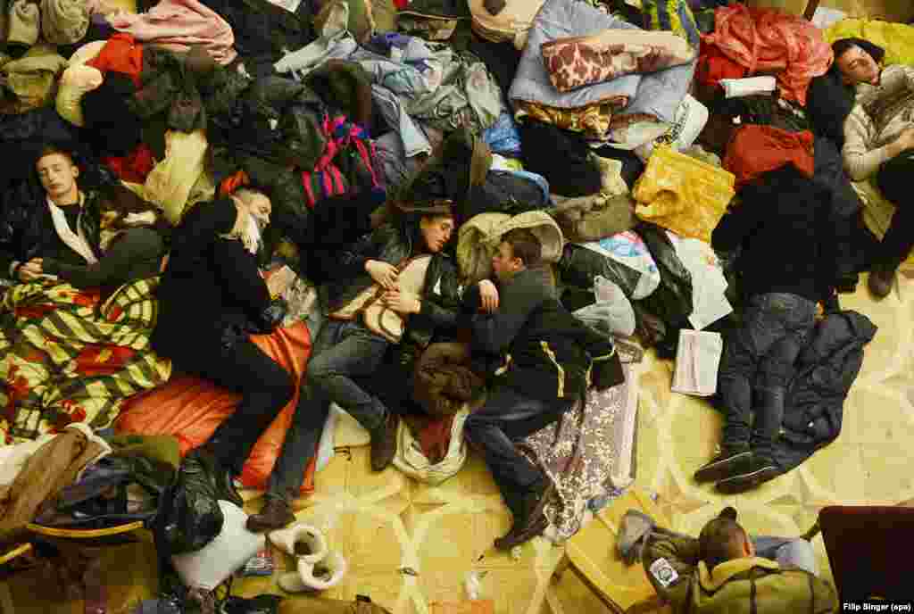 Occupying protesters sleep inside Kyiv's City Hall.