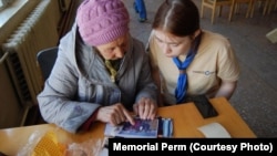A participant in a Along The Rivers Of Memory in Teplaya Gora in May 2017