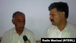 د مشال همکار خالدخان د محمد اقبال اقبال سره مرکه کوي. 