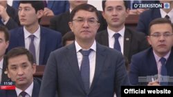 Newly appointed Finance Minister Jamshid Qochqorov appears before parliament in December 2017.