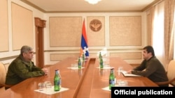 The de facto president of Nagorno-Karabakh, Arayik Harutiunian (right), and the region's security chief, Vitaly Balasanian (left), seem to be vying for control and influence in the disputed territory. (file photo)