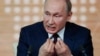 Russian President Vladimir Putin speaks during his annual end-of-the-year news conference in Moscow on December 19.
