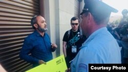 Активист Бахром Хамраев.