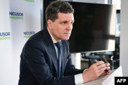 Presidential candidate and mayor of Bucharest, Nicusor Dan attends a press conference with foreign journalists at his campaign headquarters in Bucharest April 23, 2025.