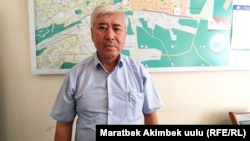 Урмат Аттокуров.