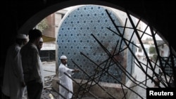 Wreckage left in the aftermath of twin suicide bomb attacks in Lahore