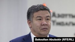 Алмамбет Шыкмаматов.