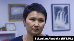 Рита Карасартова.