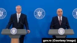 Premierul României, Ilie Bolojan (dreapta), și secretarul general al Organizației pentru Cooperare și Dezvoltare Economică (OCDE), Mathias Cormann, 15 septembrie 2025.